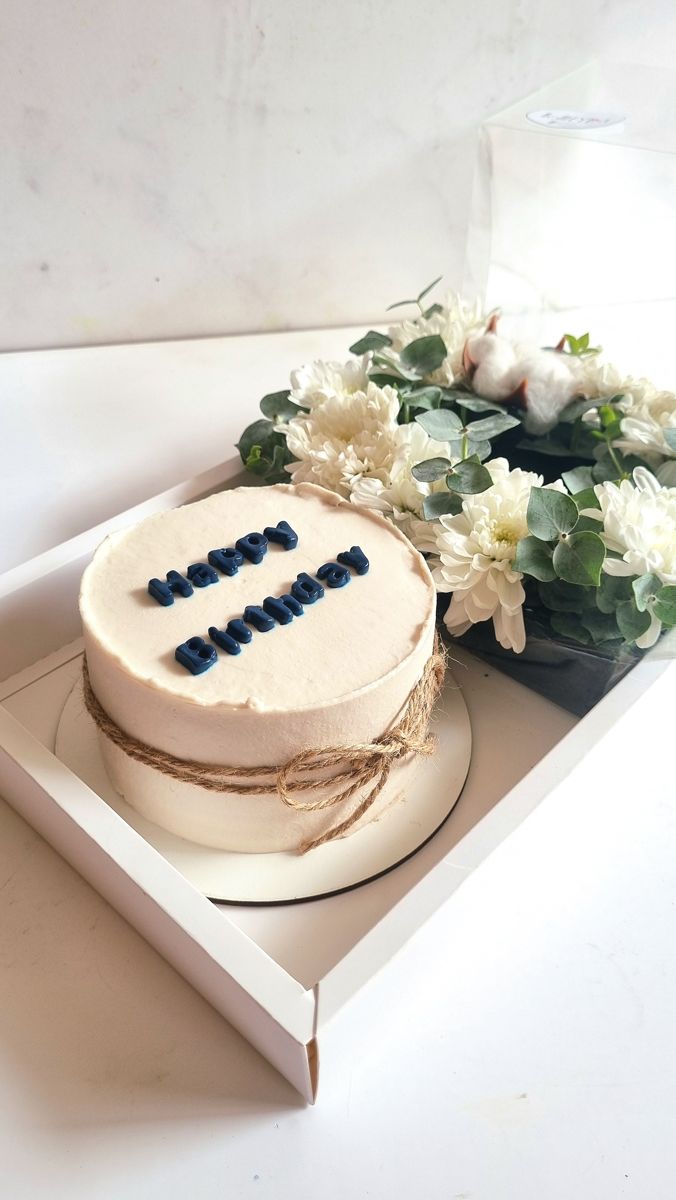 Cake and flower box, cream cake and eucalyptus