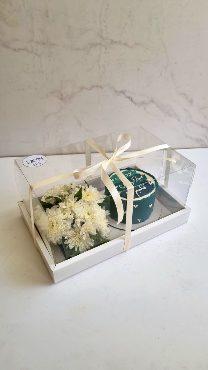 Cake and flower box, teal cake and daisies