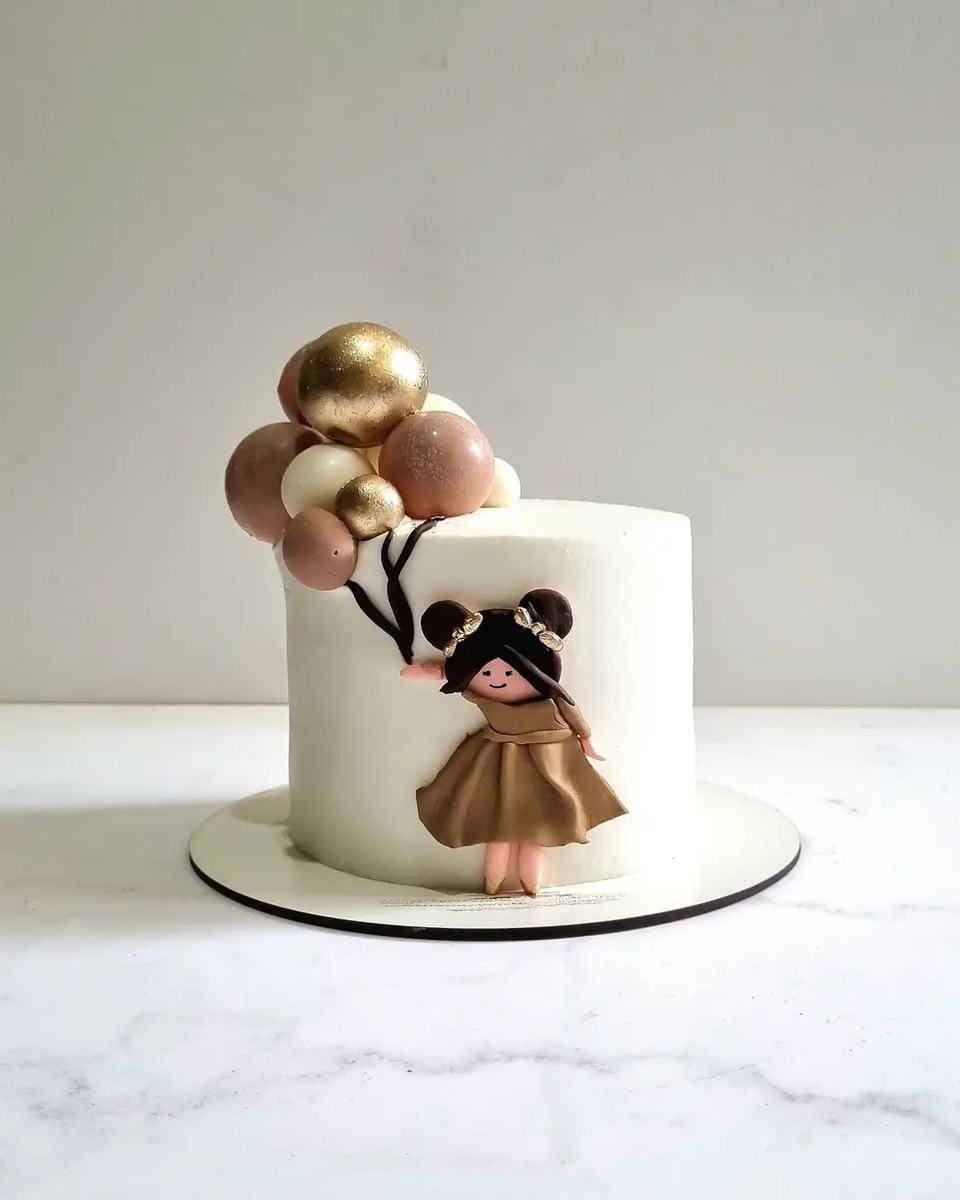 Hand-sculpted fondant figure cake
