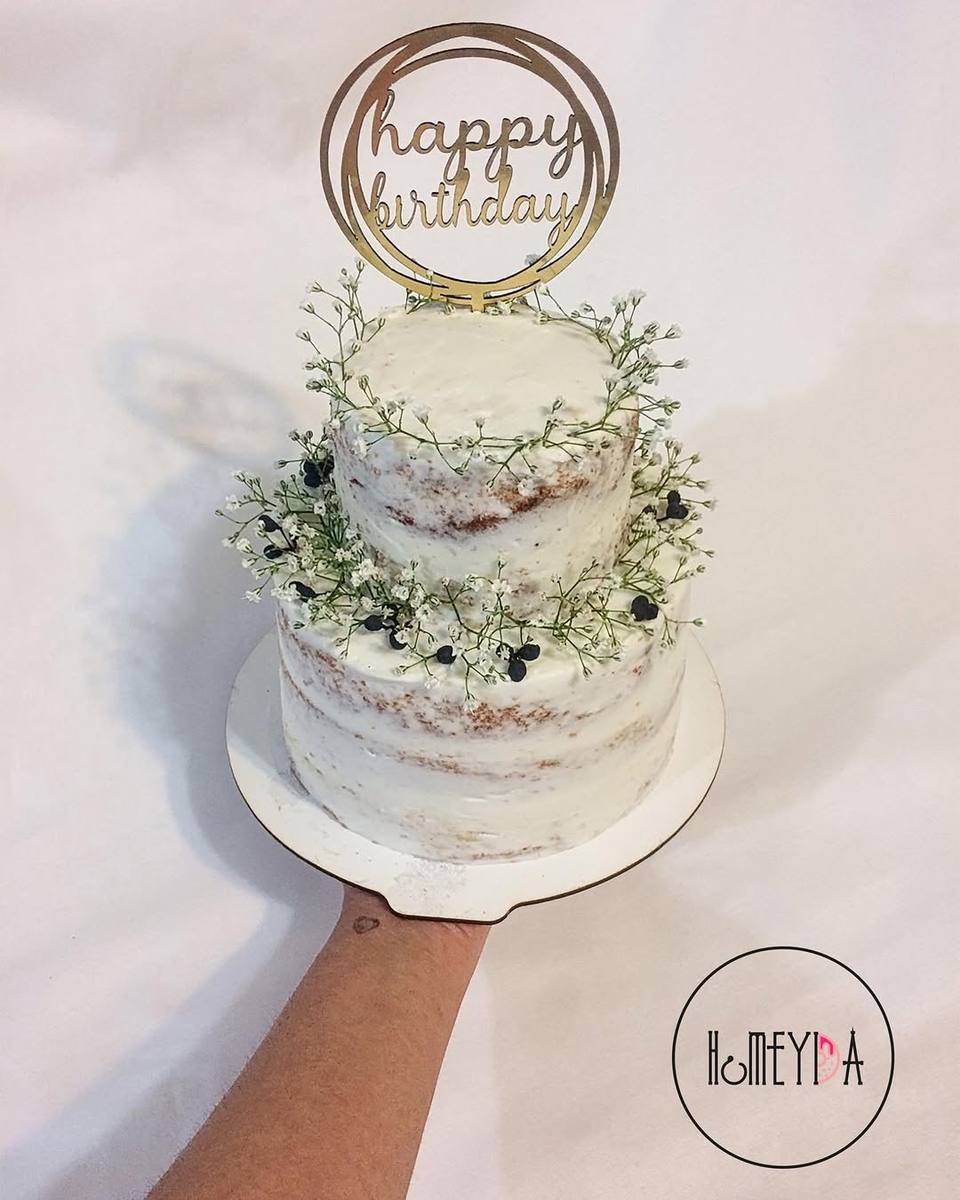 Tiered engagement cake with pearls